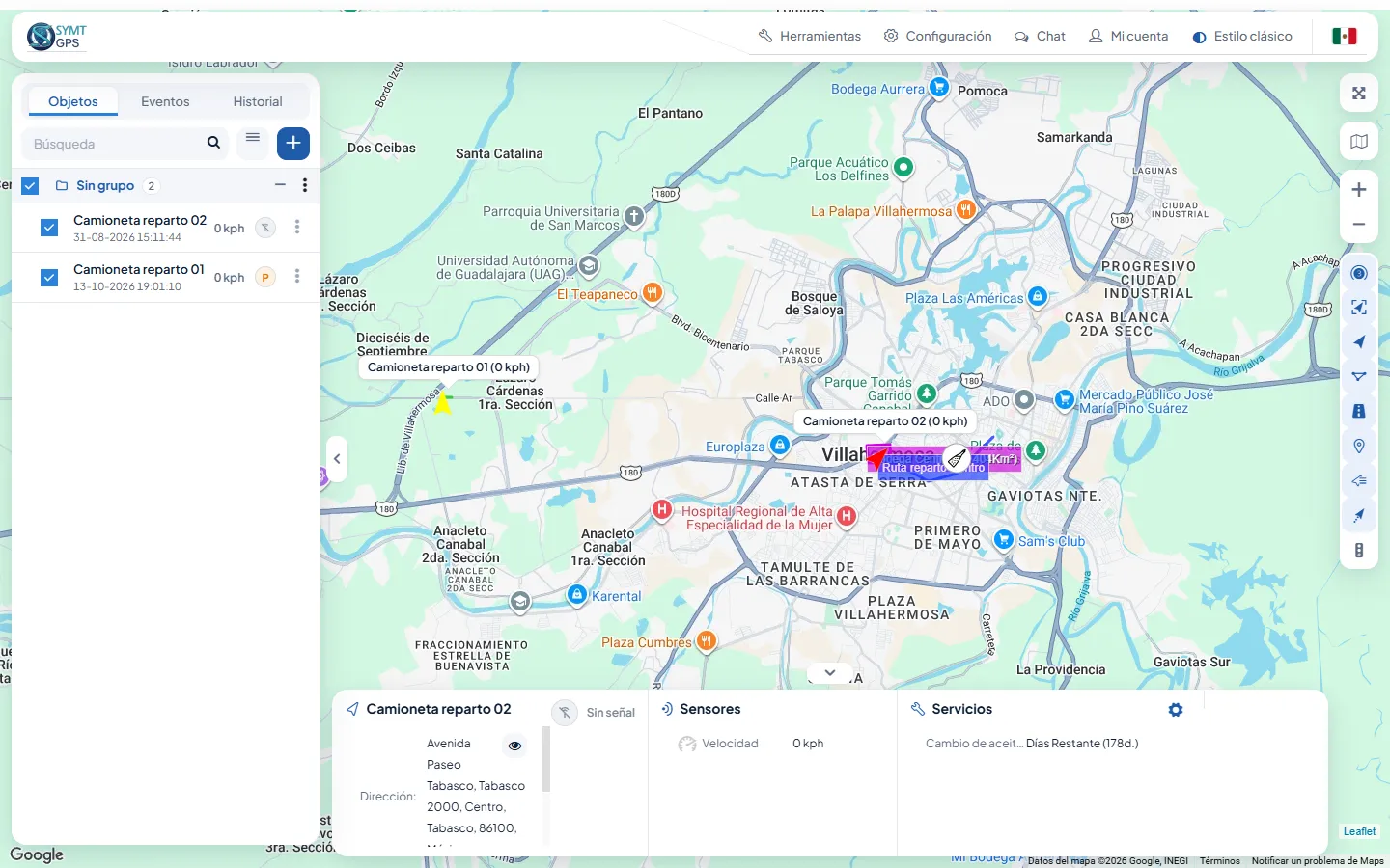 Plataforma SYMT GPS: lista de unidades a la izquierda, mapa con dos camionetas y, abajo, los datos de la unidad seleccionada
